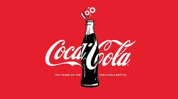 Logotipo da Coca-Cola com fundo vermelho – Aplicação prática da psicologia das cores , onde o vermelho estimula emoções de energia, paixão e desejo de consumo.